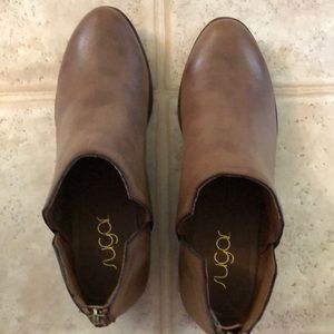 Brown booties with cute zipper detail on back